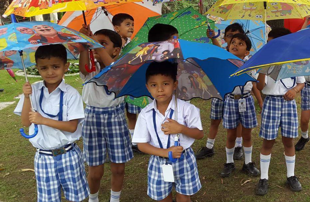 Students enjoyed the rain by celebrating Umbrella Day